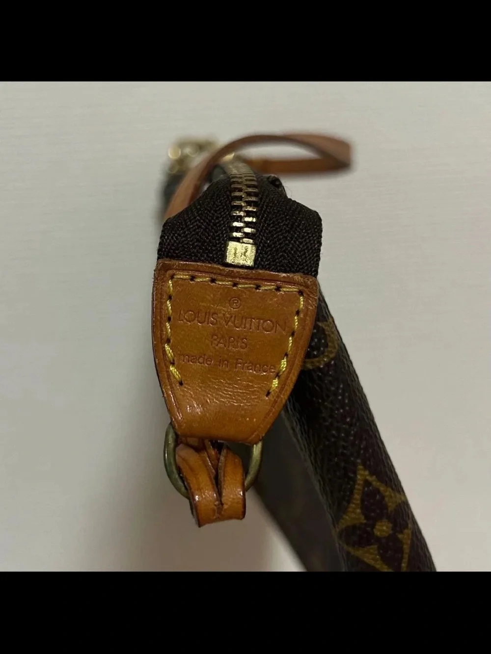 Louis Vuitton Monogram Canvas Wristlet in Brown and Tan